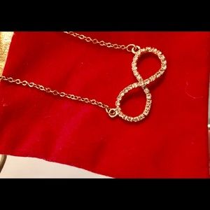 Beautiful infinity necklace gold plated with Swarovski crystals